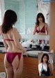 A woman in a red lingerie standing in front of a mirror.